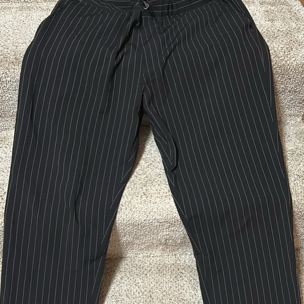 Women’s pinstriped dress pants.